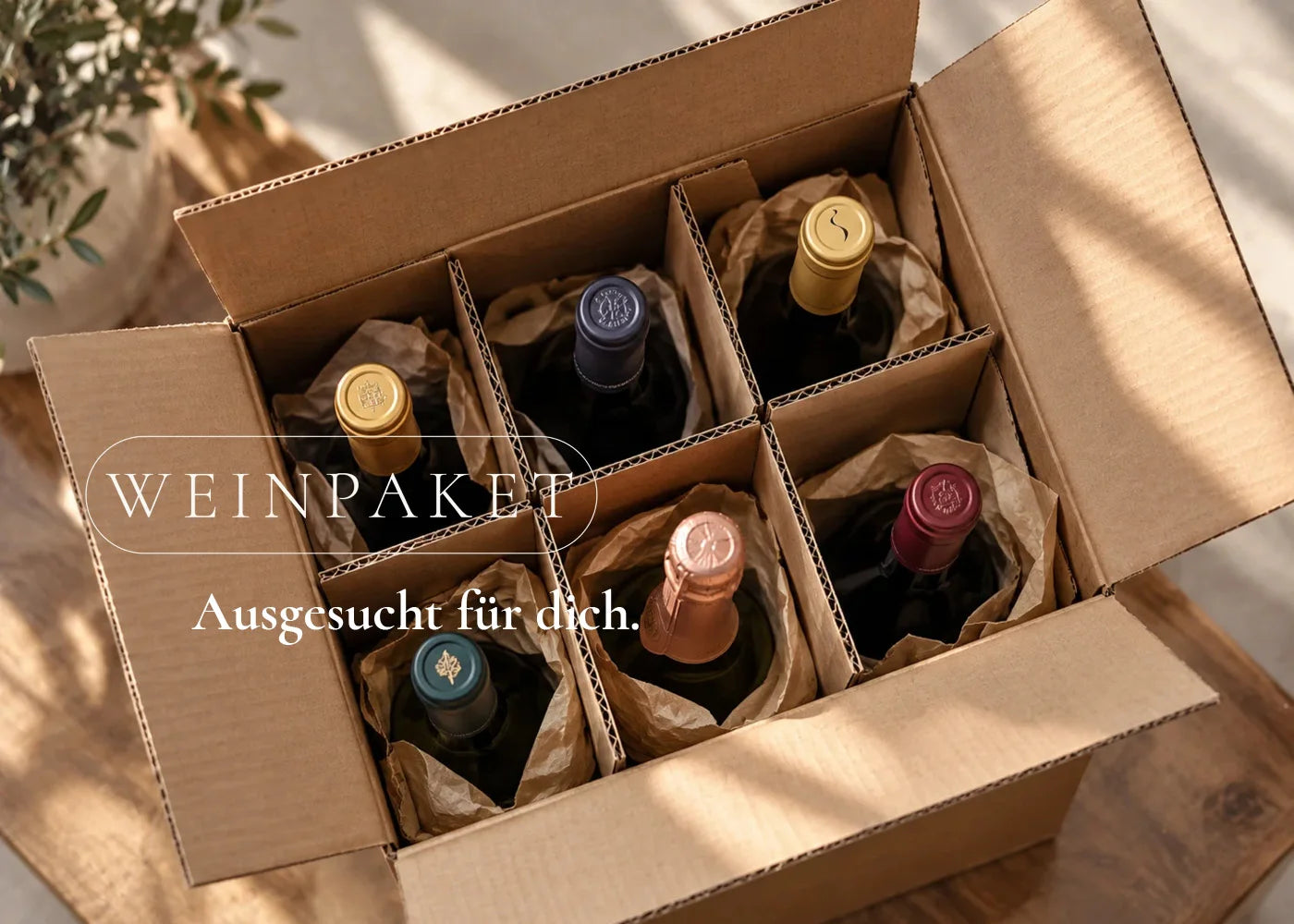 Geöffnetes Weinpaket mit sechs ausgewählten Weinflaschen von Weinpicker